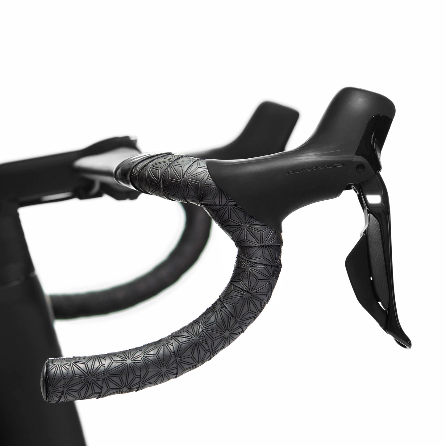 SUPER STICKY KUSH GRAVEL BLACK HANDLEBAR TAPE W/ BLACK ANODIZED PLUGS